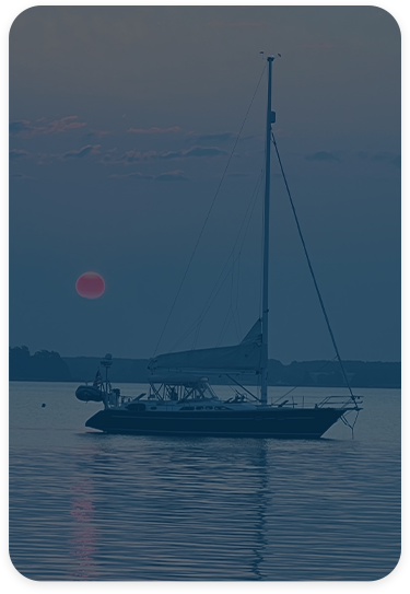 A sailboat at sunrise